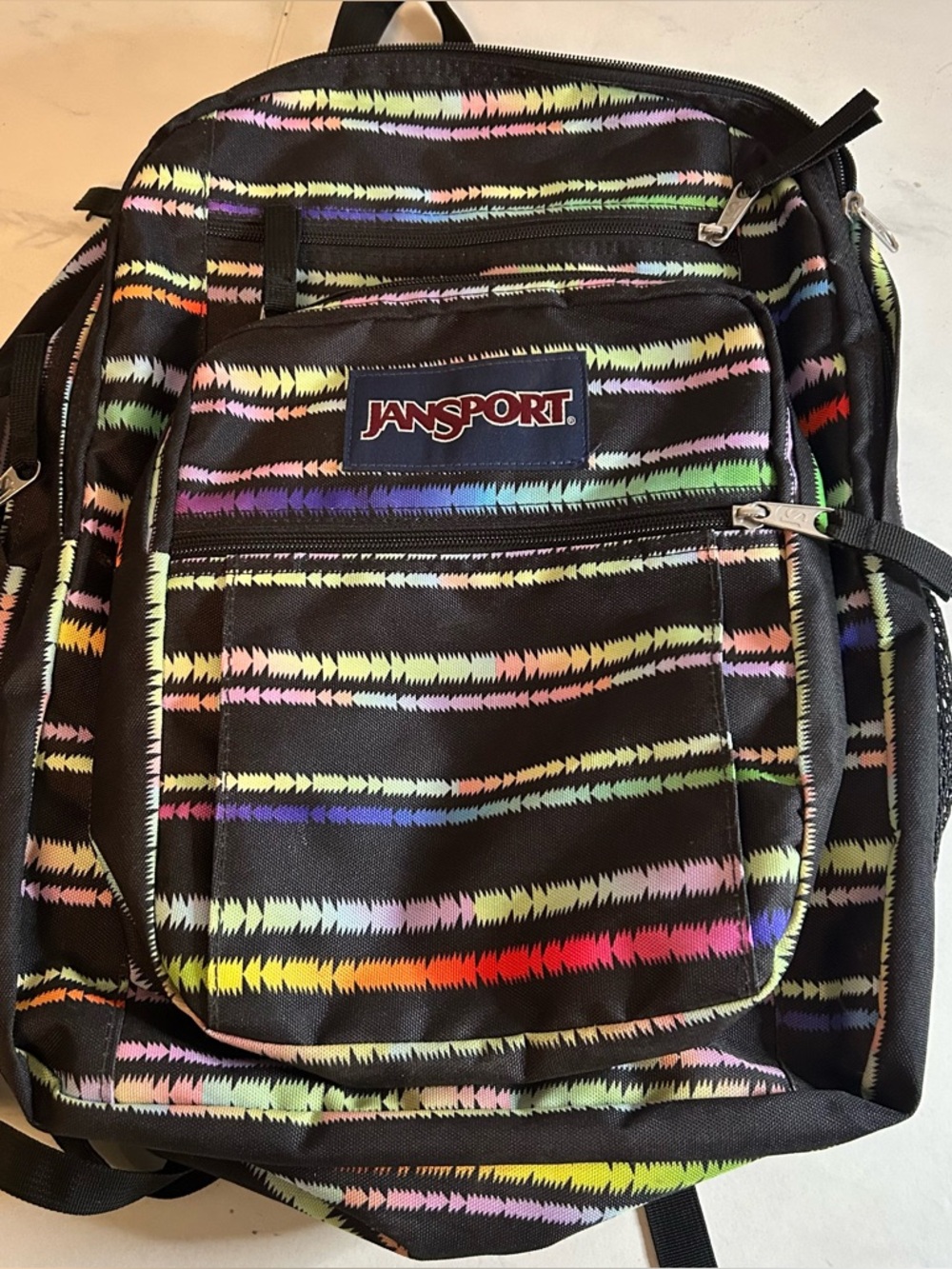 Jansport Black Backpack with Multicolor Zigzag Stripes